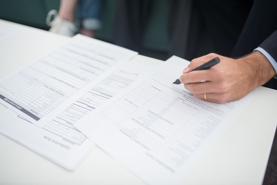 Signing mortgage documents for a UK property purchase