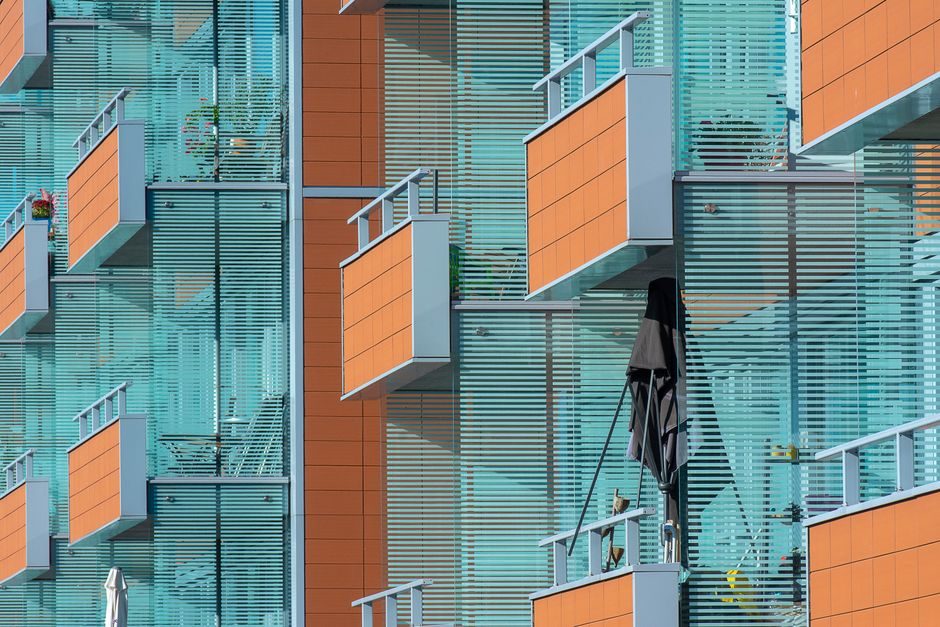 A modern new-build apartment building in London, typical of the type purchased by families using a JBSP mortgage arrangement