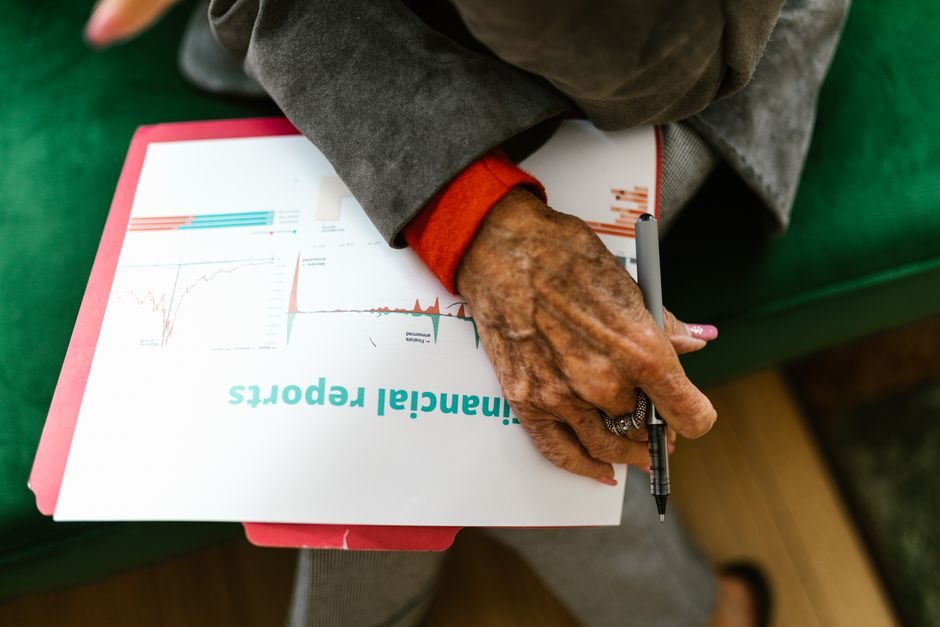 A family reviewing investment and financial planning documents