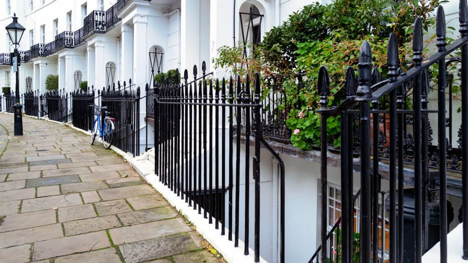 A row of London terraced houses on a residential street