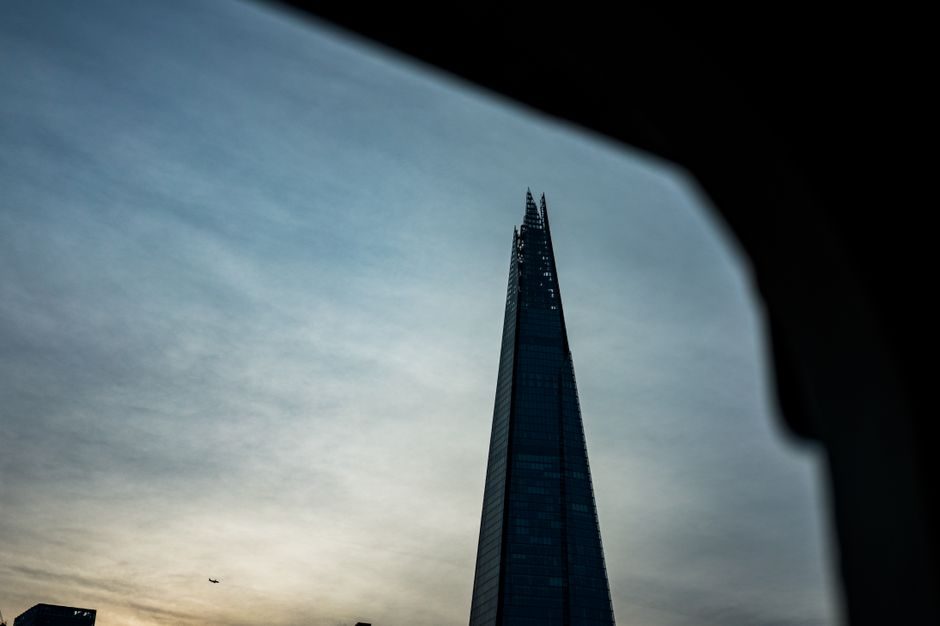 The Shard silhouetted against a twilight sky, showcasing London's iconic skyline.