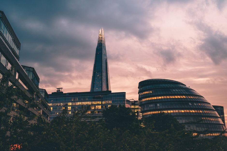 View of The Shard and cityscape in London during a dramatic sunset.