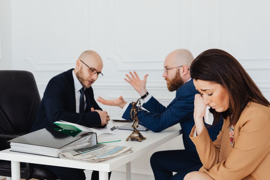 A family discussing UK property ownership with a solicitor