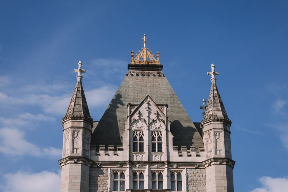 Close-up of a Gothic Revival building facade in London, showcasing intricate architectural details.