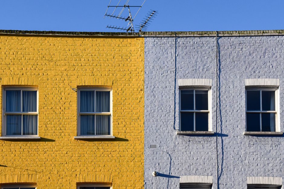 A row of terraced houses on a London residential street, typical of UK buy-to-let properties