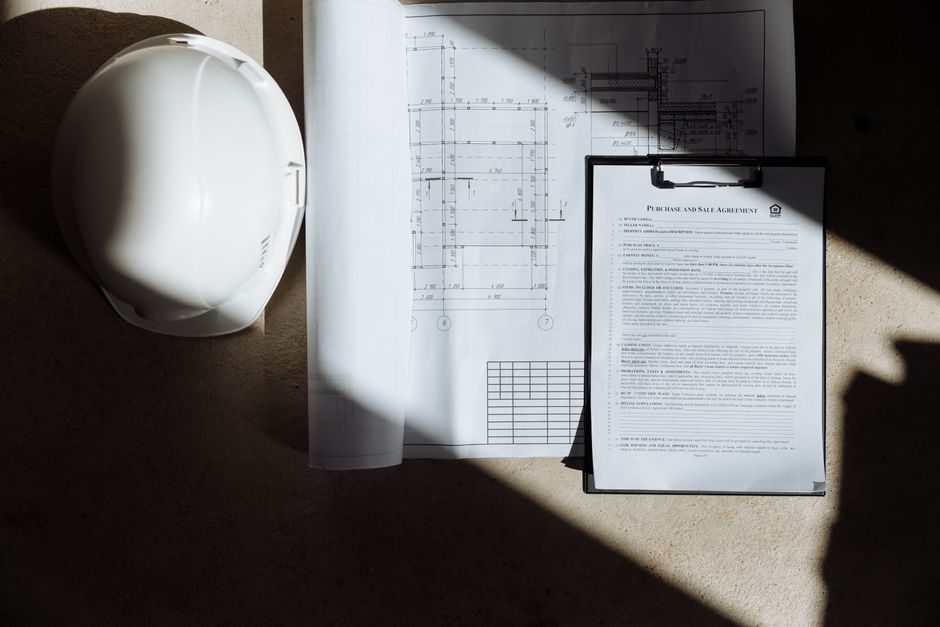 UK tenancy agreement documents and property keys on a desk