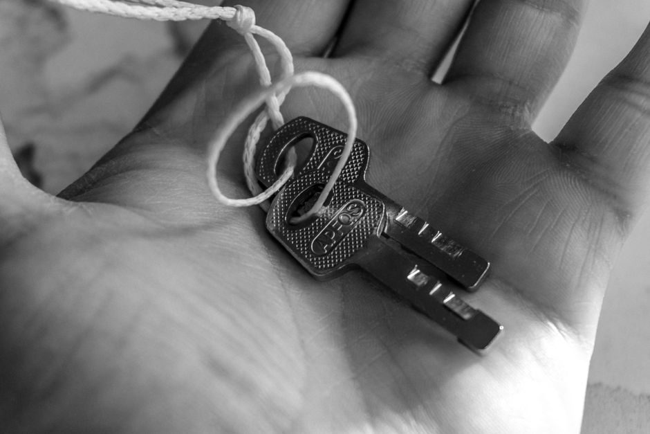 House keys being handed over on completion of a UK property purchase