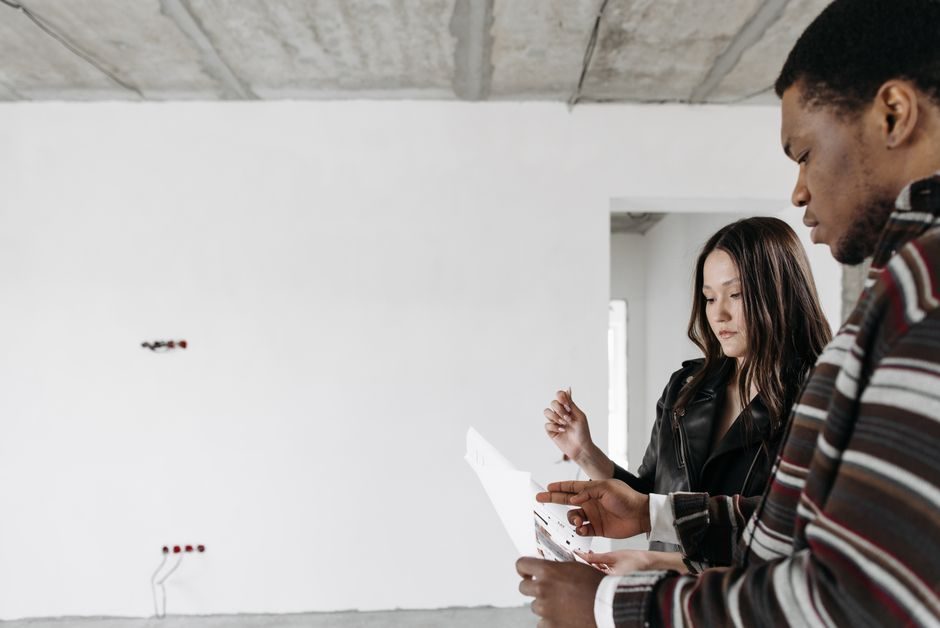 An overseas investor reviews new-build development plans and brochures