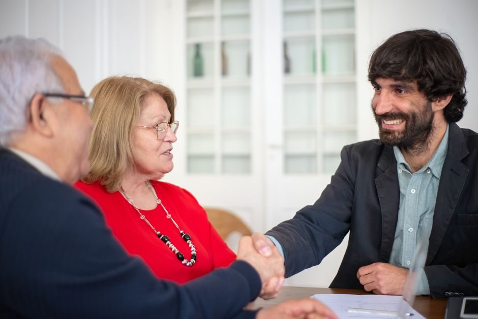 Property advisor discussing purchase costs with a client