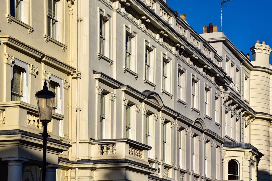 A beautiful example of Victorian architecture in a sunlit London street.