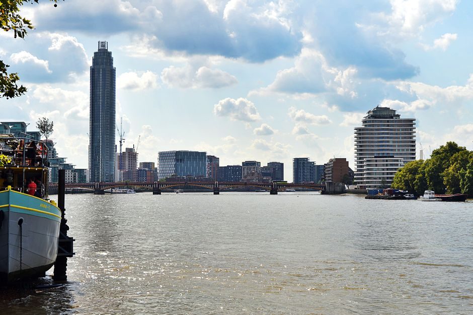 The River Thames waterfront and London skyline on a summer day